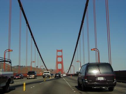 Golden Gate Bridge from our car<br>Location: <a href="https://www.google.com/maps/search/?api=1&query=37.8155,-122.47801" target="_new">Golden Gate Bridge</a>